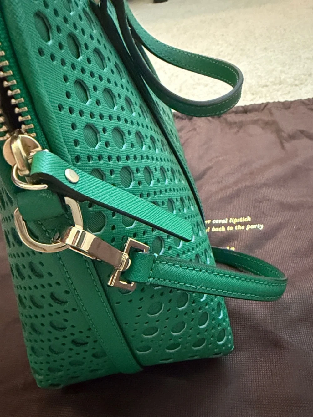 kate spade green perforated satchel with gold plaque